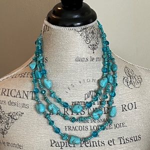 Tuquoise 3 strand necklace with blue crystals & silver beads.